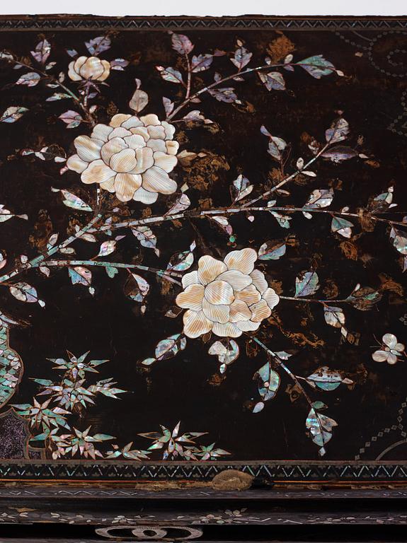 A  Chinese black lacquered altar table with mother of pearl inlay, 17th /18th Century.