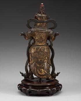 A gilt bronze figure of a daoistic deity, late Ming dynasty, 17th Century.