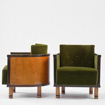 A pair of 1930s birch armchairs.