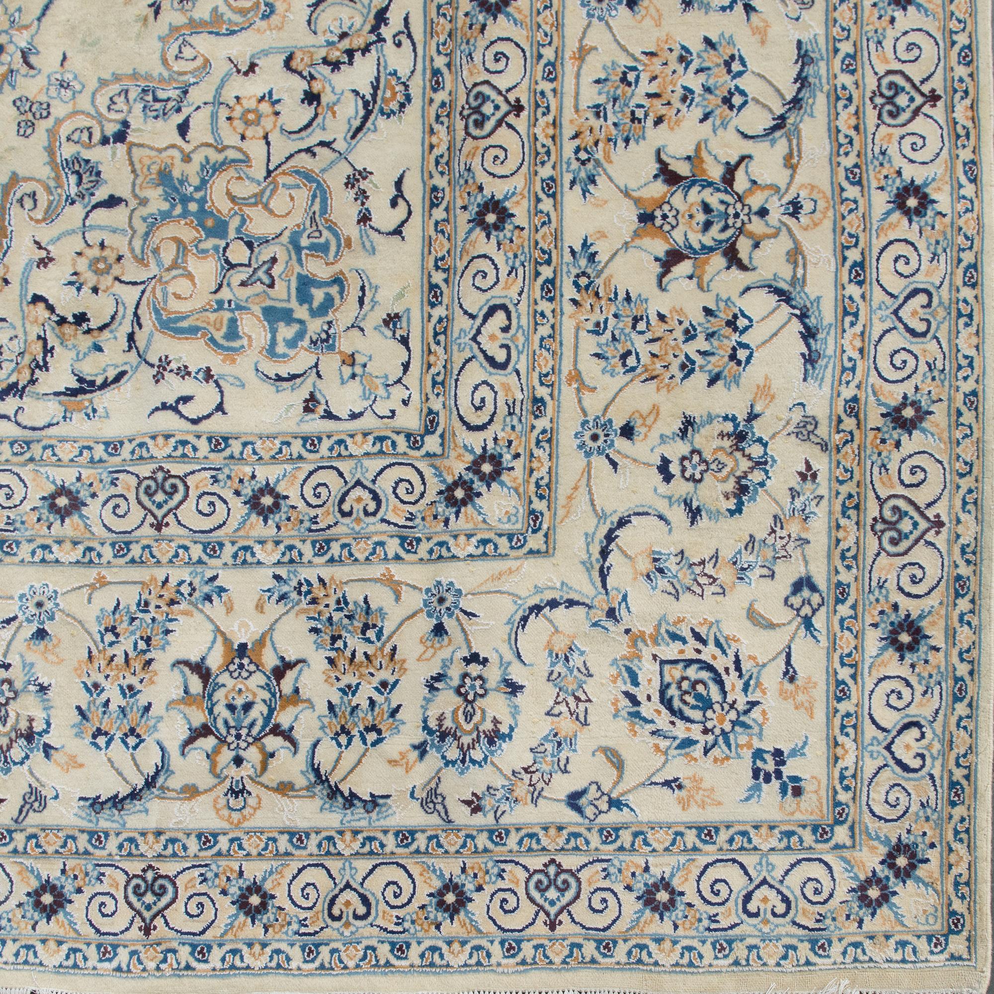 A carpet, Nain, part silk, 9 LAA, ca  577 x 380 cm.