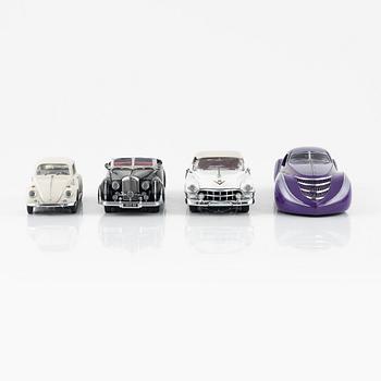 Four die cast model cars and four die cast model motor bikes, Franklin Mint.