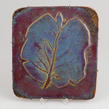 Toini Muona, a stoneware wall plaque, Finland, signed.