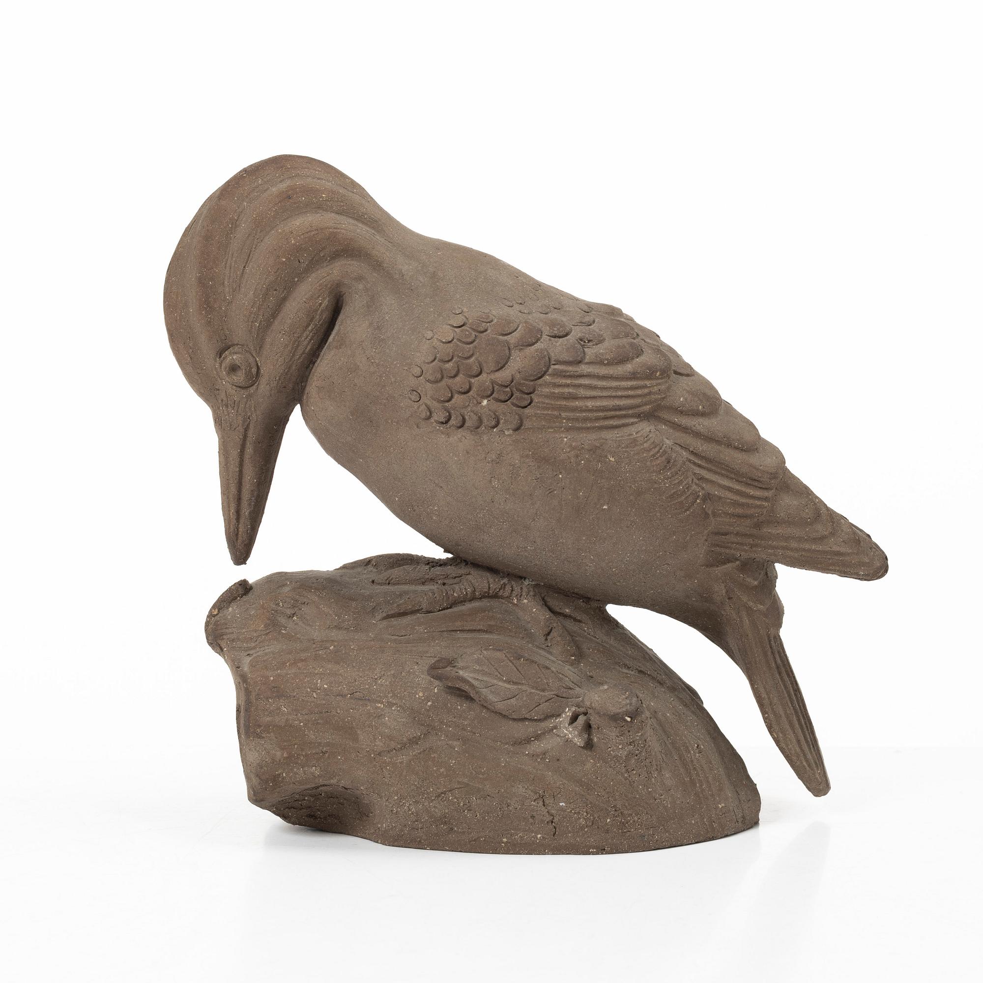 Tyra Lundgren, a stoneware sculpture of a woodpecker, executed in her own studio.