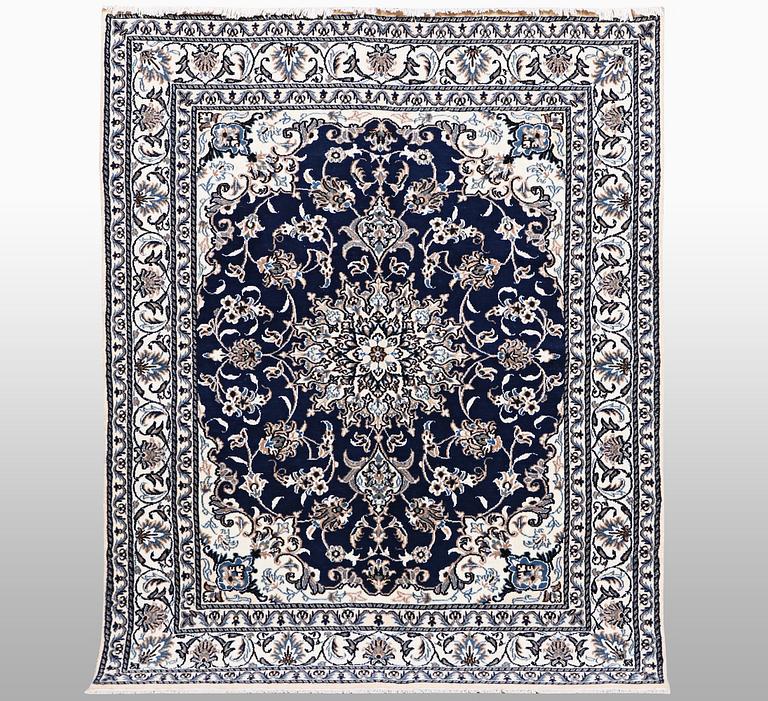 A carpet, Nain, part silk, ca 202 x 148 cm.