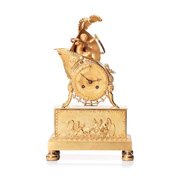 119. A French Empire mantle clock, early 19th century.