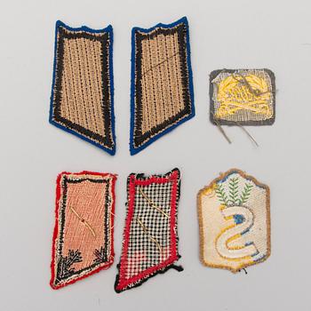 PARTI EPÅLETTER, TECKEN OCH KNAPPAR, cirka 65 st, Finland, 1900-talets första hälft/-mitt.