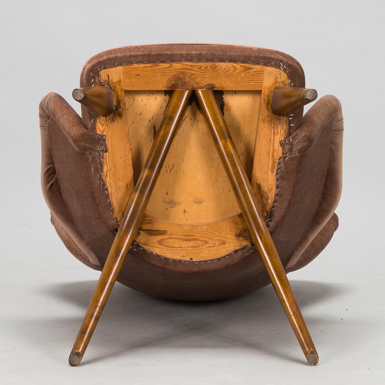 Carl Gustaf Hiort af Ornäs, a 'Siesta' armchair,  Puunveisto Oy - Träsnideri Ab, Finland 1940s-50s.