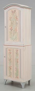 A Carl Malmsten painted cabinet 'Iceland' with carved decoration.