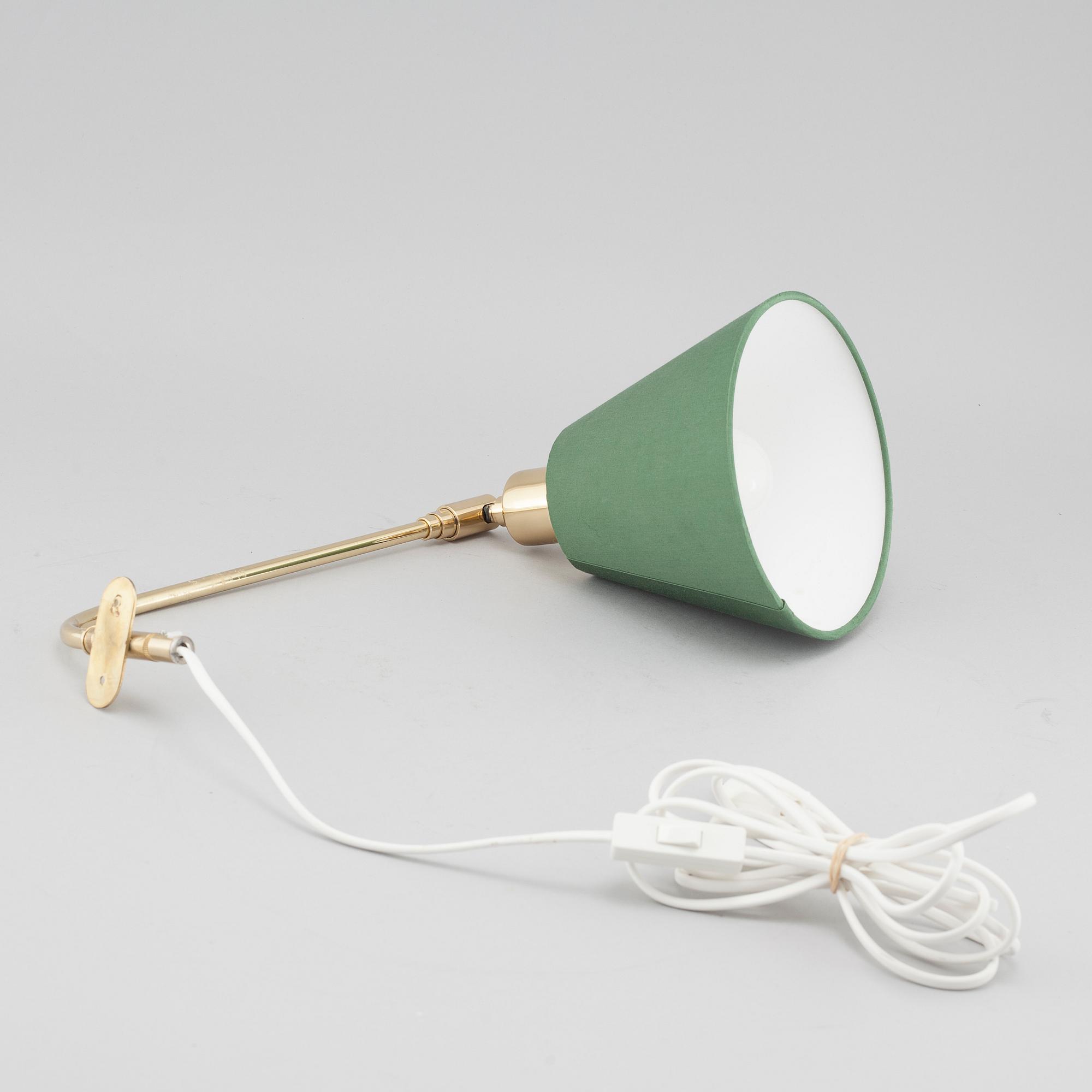 A wall lamp by JOSEF FRANK, model nr 2226, Firma Svenskt Tenn.