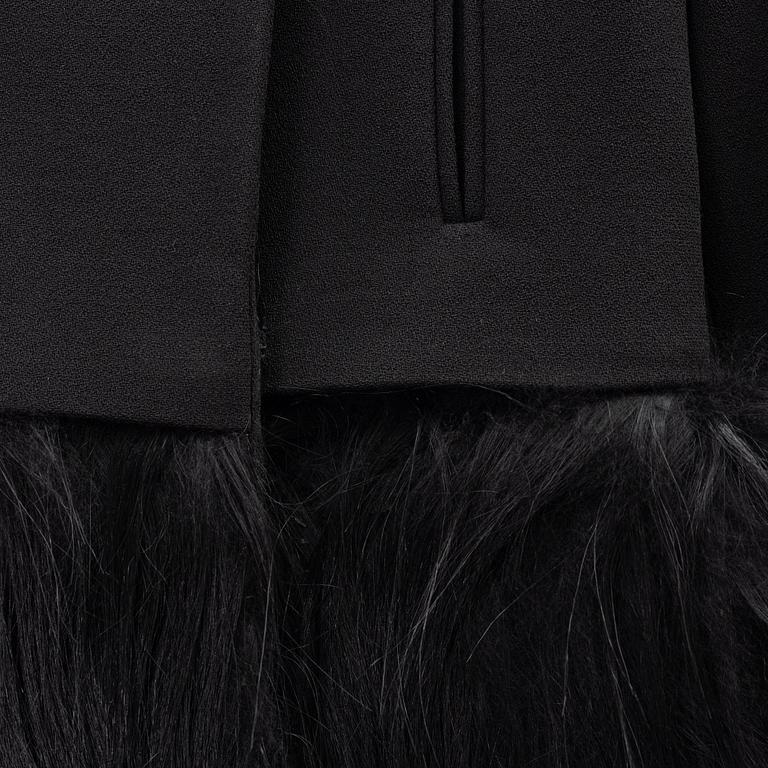 Céline, a black wool and fur coat, size 34.