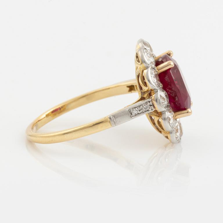 An 18K gold and platinum ring set with a faceted ruby weight ca 3.35 cts.