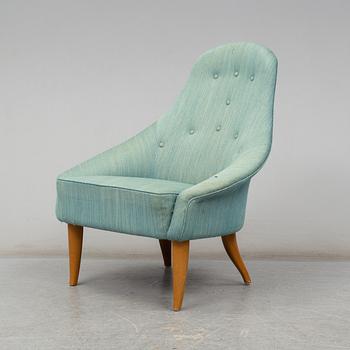 KERSTIN HÖRLIN-HOLMQVIST, a 'Lilla Eva' easy chair, for Nordiska Kompaniet, mid 20th century.