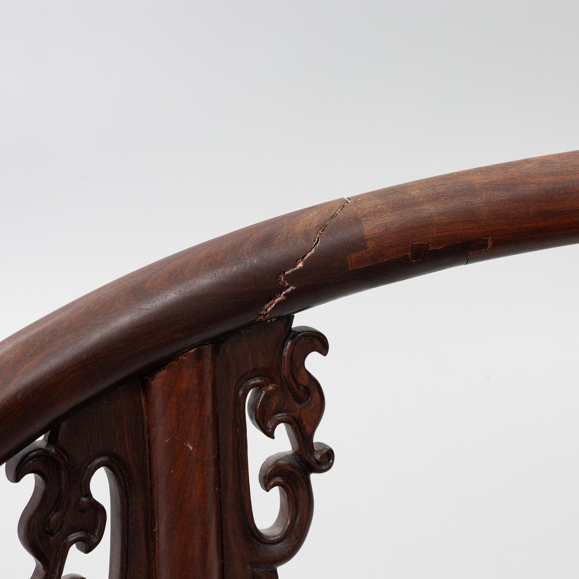 A Chinese hardwood folding chair, 20th century.