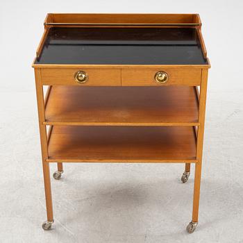 Josef Frank, a serving table/bar table, model 2227, Firma Svenskt Tenn, second half of the 20th century.