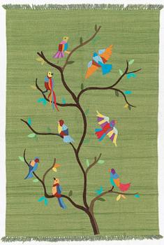 A hand-embroidered Kelim rug, 184 x 124 cm.