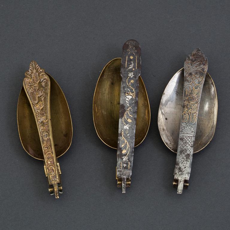 Four 18th century brass and iron spoons.