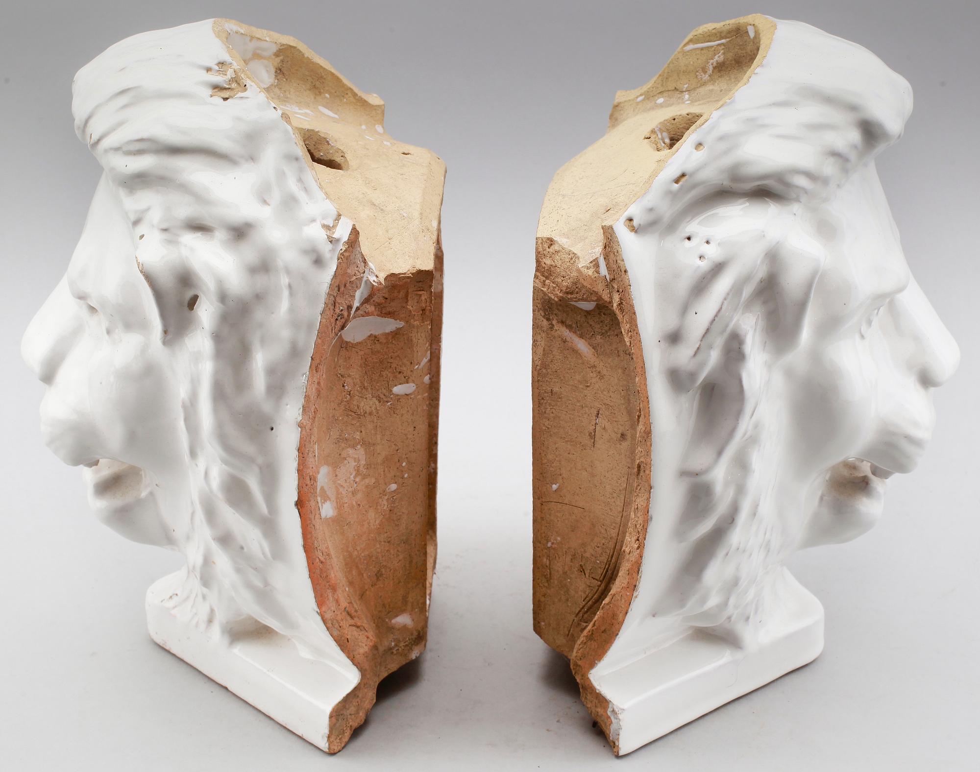 DEKORELEMENT, 2 st, till kakelugn, 1900-talets första hälft.