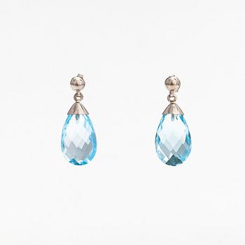 A pair of 14K white gold and topaz earrings.