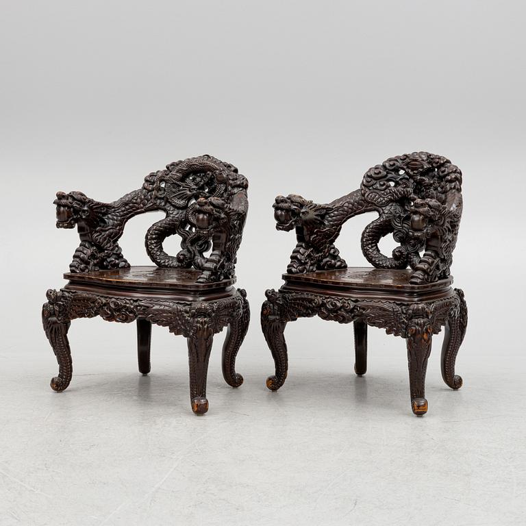 A pair of Chinese hardwood chairs, 20th century.