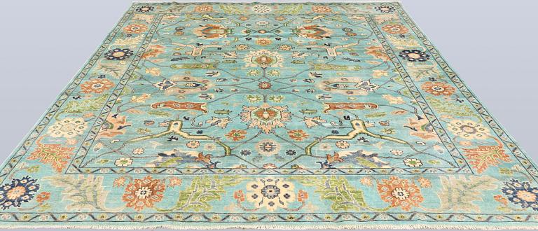 A rug, Ziegler design, approx. 290 x 235 cm.