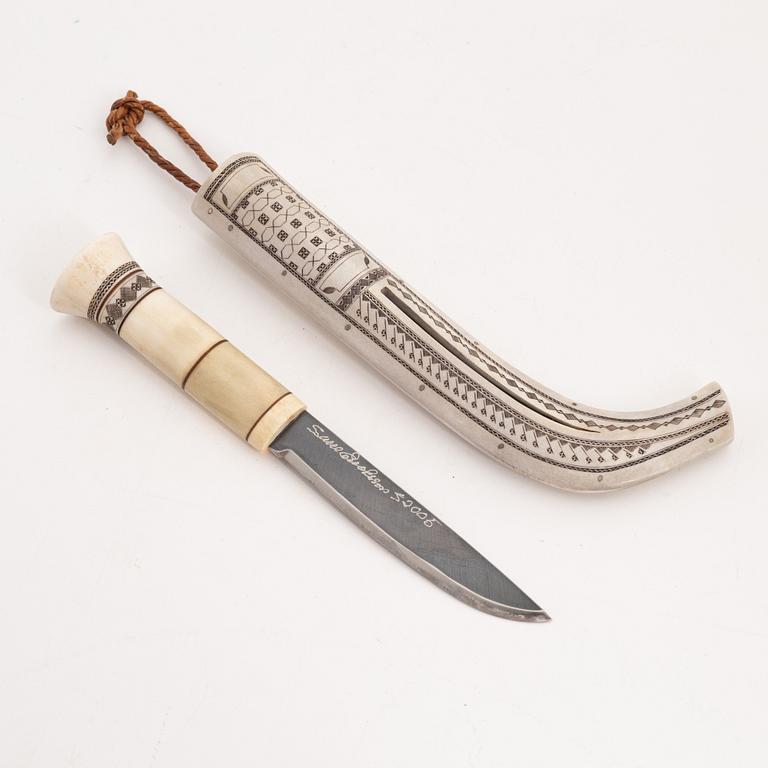 A reindeer horn knife by SUne Enoksson, signed.