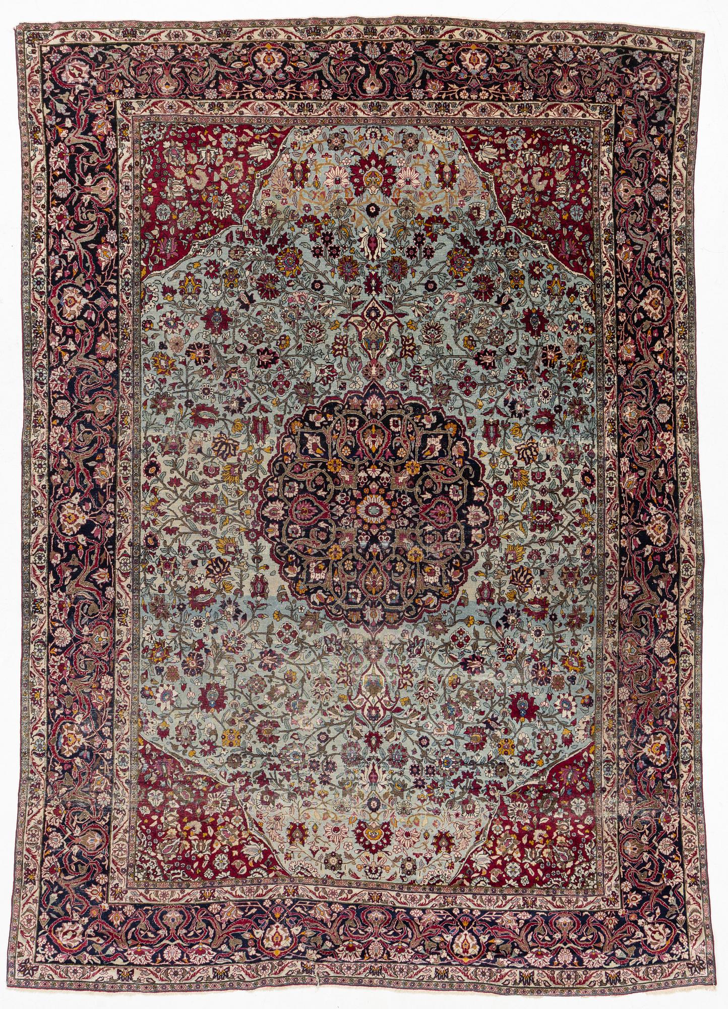 An antique Isfahan carpet, circa 342 x 250-260 cm.