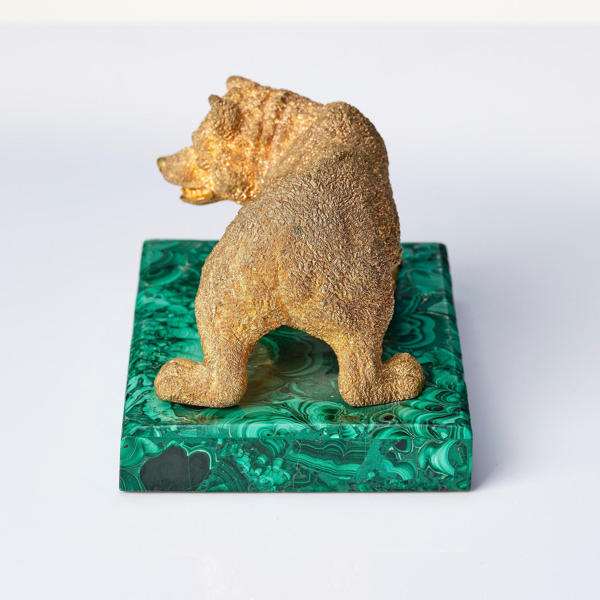 A Russian Nicholas II malachite-veneered and ormolu paperweight, late 19th century.