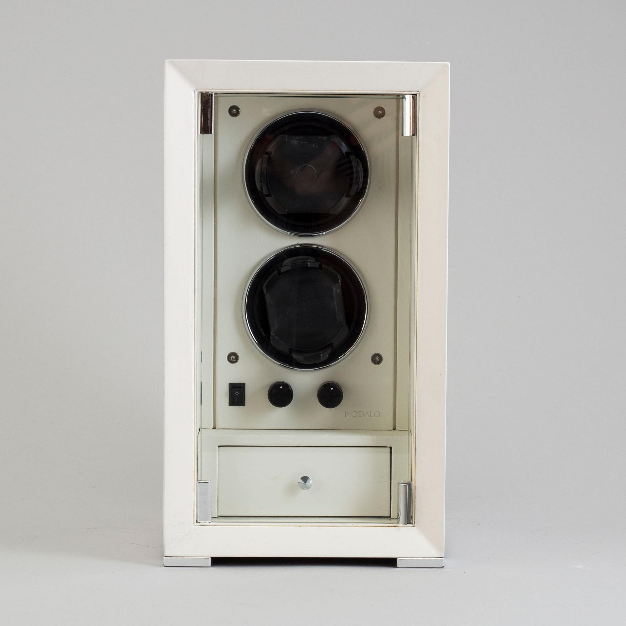 MODALO, winder, ca 18 x 18 x 22 cm.