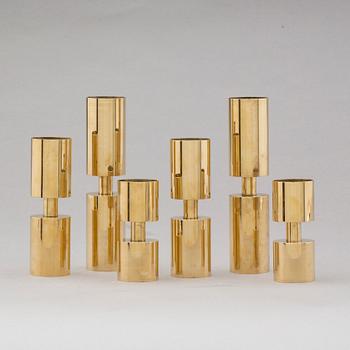 VÄRMESLJUSHÅLLARE, 3 par, mässing, för Zoégas 90-årsjubileum, 1976.