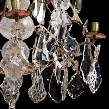 A Swedish rococo gilt-brass and cut glass six-branch chandelier by O. Westerberg (master in Stockholm 1769-1811).