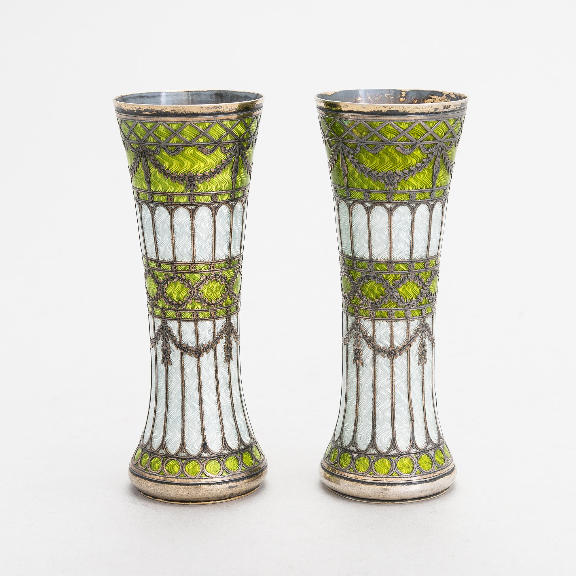 A pair of bud vases in parcel-gilt silver and guilloche enamel, early 20th century.