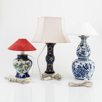 Three table lamps, porcelain and glazed earthenware, China and Europe, early 20th century.