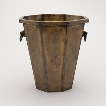 A patinated brass champagne bucket from the first half of the 20th Century.