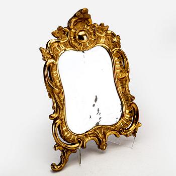 A mid 18th century gilded rococo mirror.