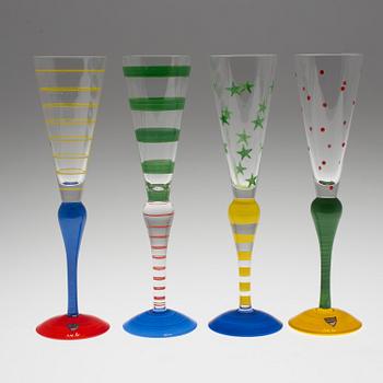 A set of eight Orrefors "Clown" glass champagne flutes design Anne Nilsson.