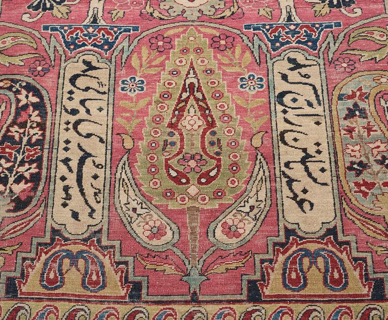 A CARPET, an antique Kerman Laver, ca 363 x 301 cm.