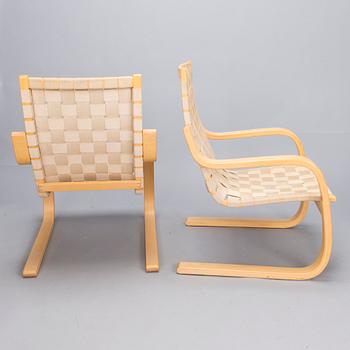 ALVAR AALTO, Pair of model '406' armchairs for Artek, late 20th century .