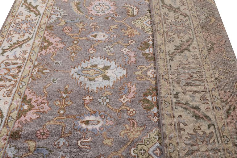 An oriental carpet of Safavid design, c. 310 x 250 cm.