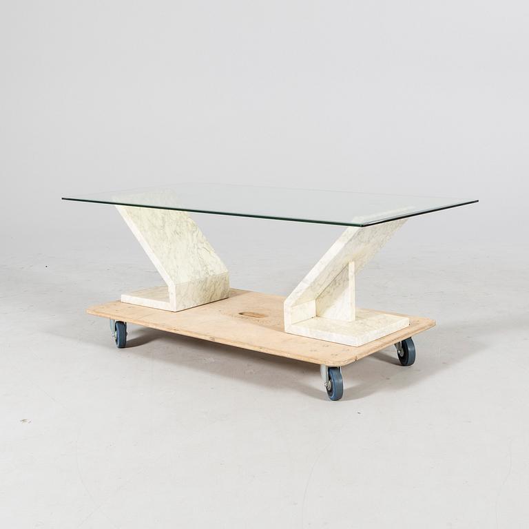 A later 20th century glass and marble coffee table.