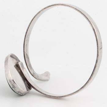 Isaac Cohen silver bangle with green stone.