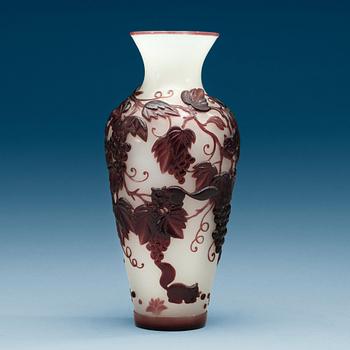 A Chinese purple overlay peking glass vase, 20th Century.