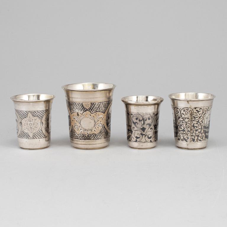 A set of four Russian 19th century silver and niello vodka cups, Moscow.