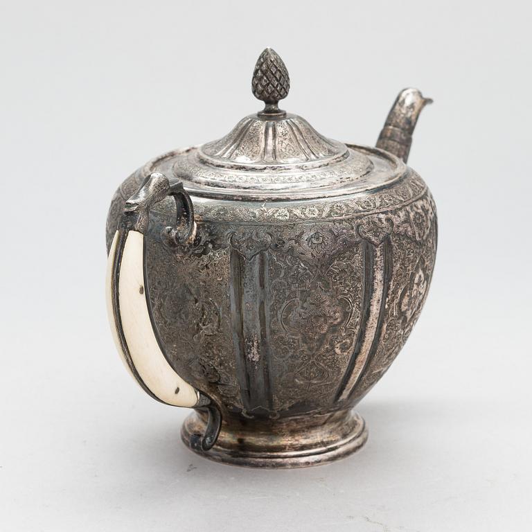 A 7-piece Persian silver tea set, 20th century.