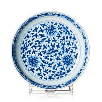 A blue and white lotus dish, Qing dynasty, Kangxi six character mark and of the period (1662-1722).