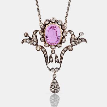 1122. A Victorian old-cut diamond and pink topaz, circa 10.00 ct, pendant. Circa 1880.