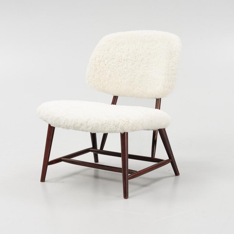 Alf Svensson, a 'TeVe', easy chair with new sheepskin upholstery, Bra Bohag, Studio Ljungs Industrier, 1950s.