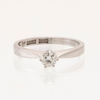 Ring 18K white gold with a round brilliant cut diamond, Sjögren & Komstadius Malmö 1963.