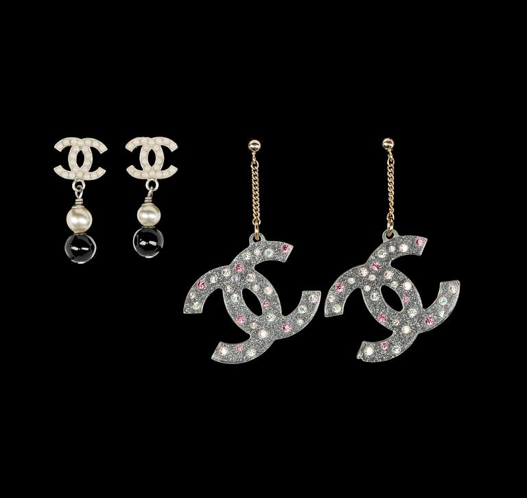 Two pair of earrings by Chanel, fall 2004.