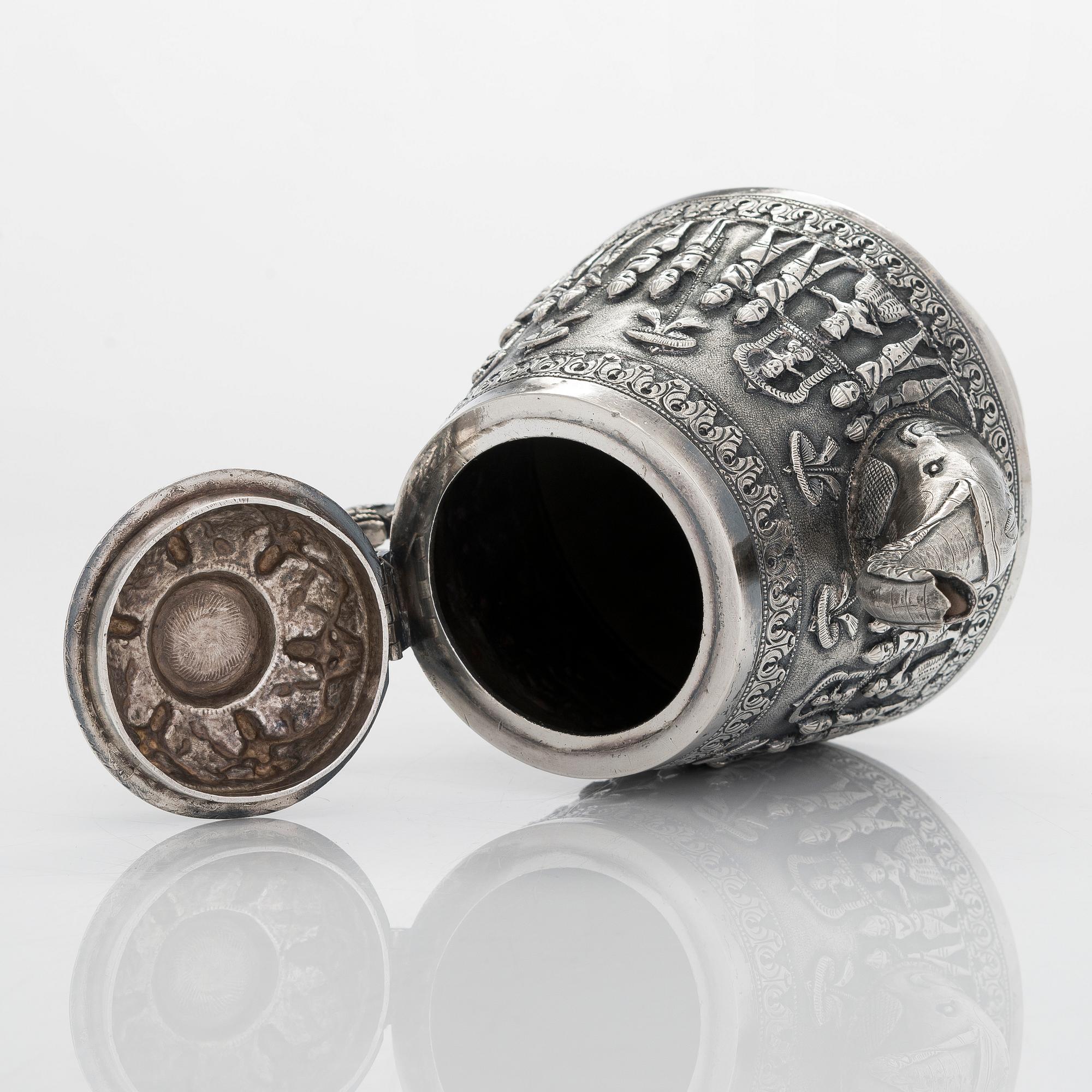 An Indian silver teapot.