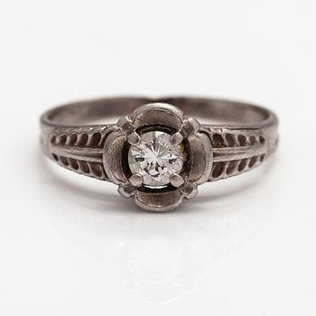 A Tillander, a palladium ring with a ca. 0.23 ct diamond. Helsinki.